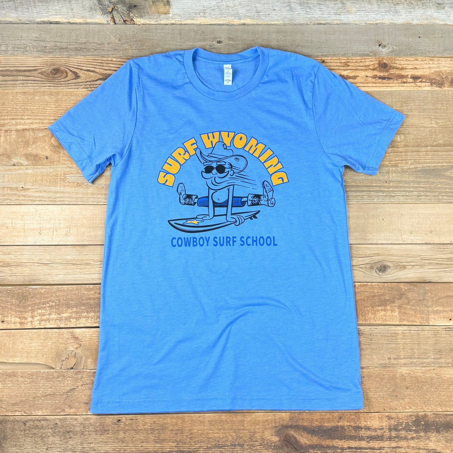 Surf Wyoming® Cowboy Surf School Unisex Tee - Carolina Blue