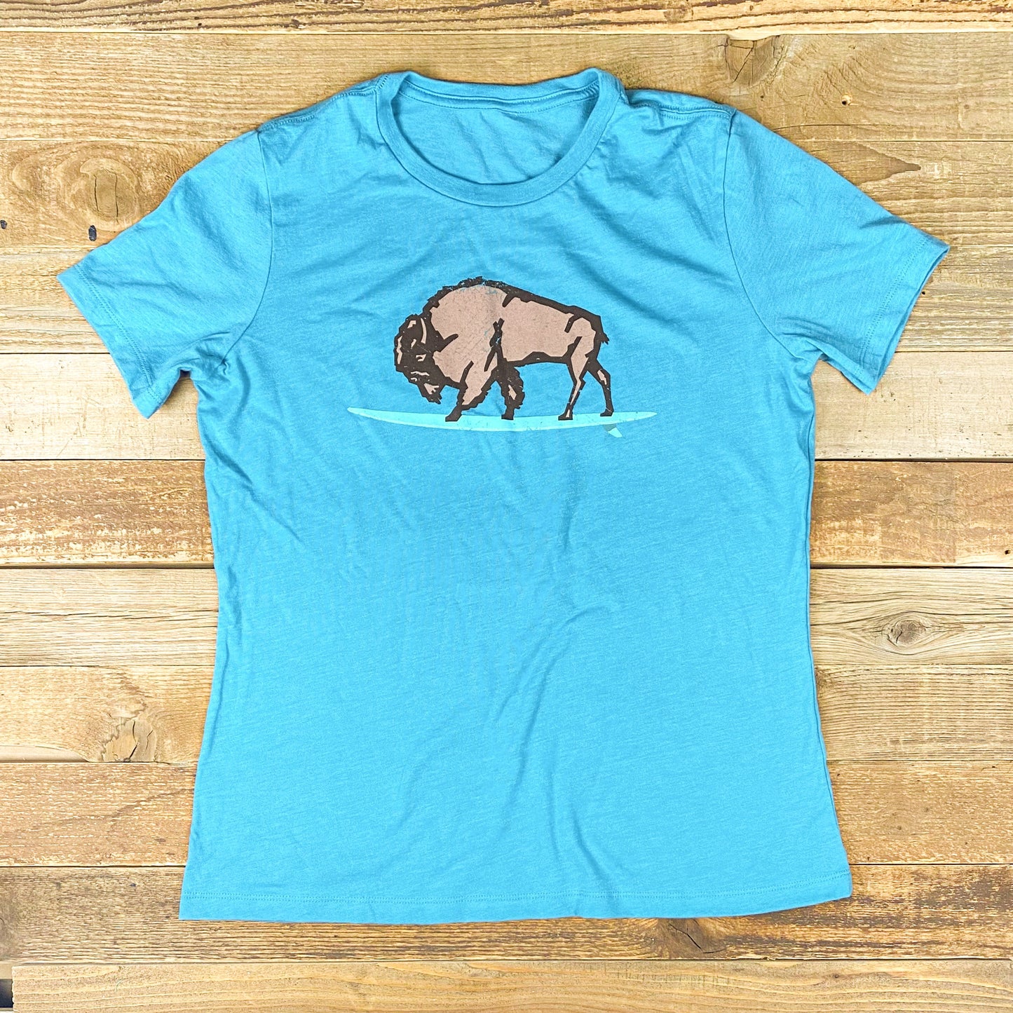 Women's Surf Wyoming® GLASSY Bison Relaxed Fit Tee - Heather Blue Lagoon