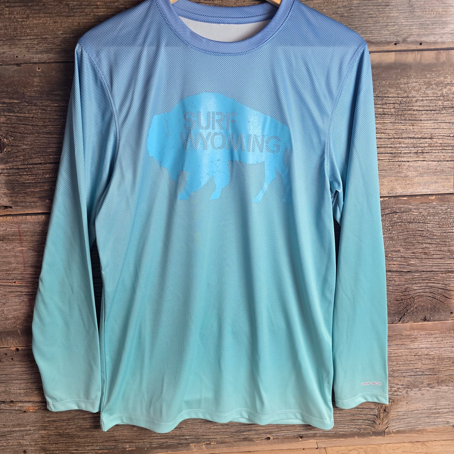 Unisex Surf Wyoming®Original LS Performance tee- upf50- bluemist