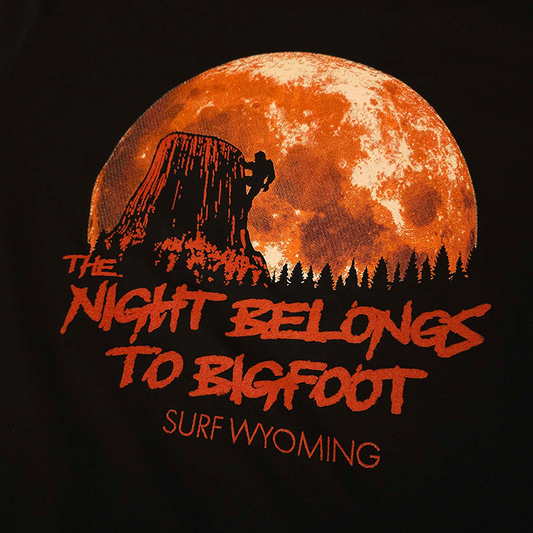 Unisex Surf Wyoming® The Night Belongs to Bigfoot Tee-black