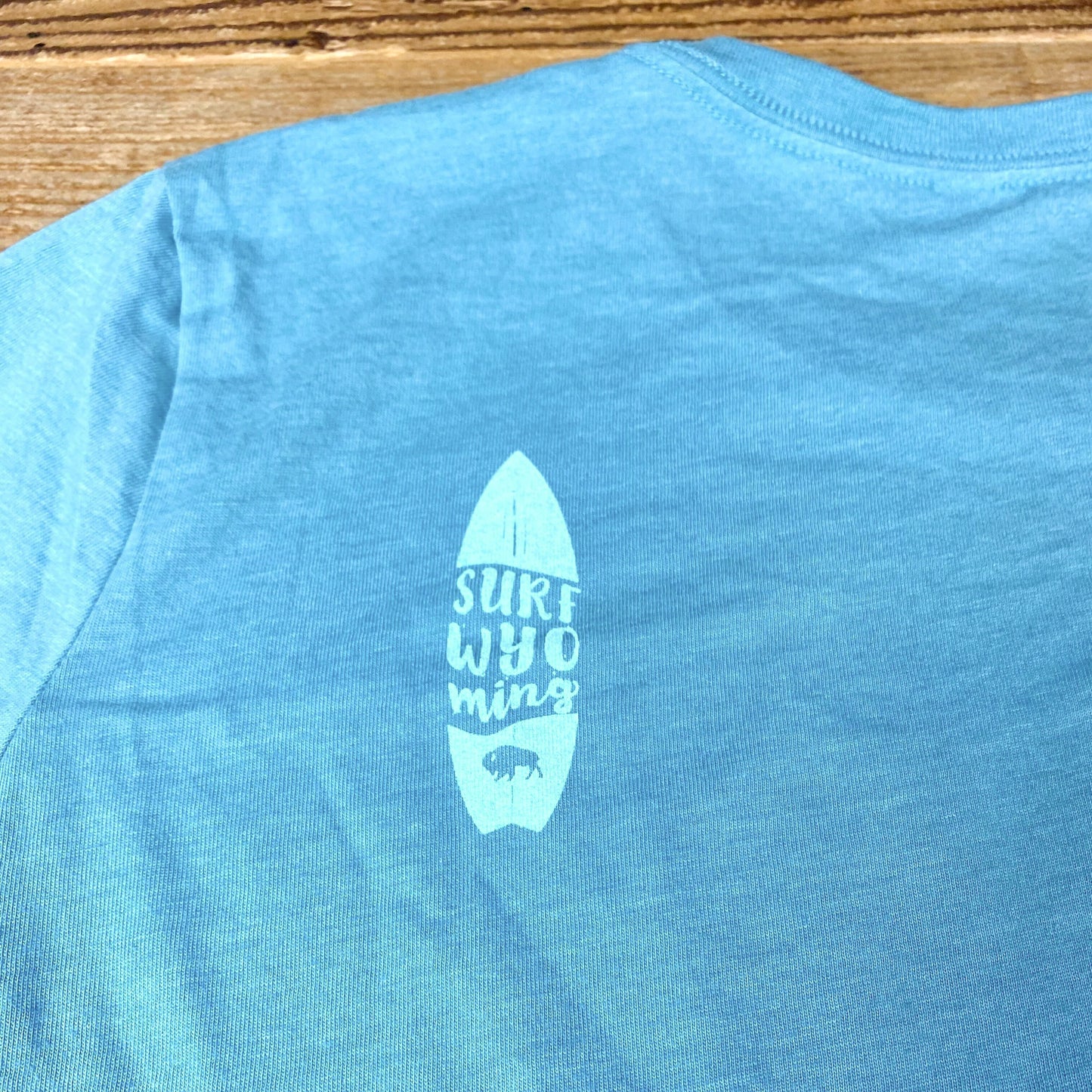 Women's Surf Wyoming® GLASSY Bison Relaxed Fit Tee - Heather Blue Lagoon