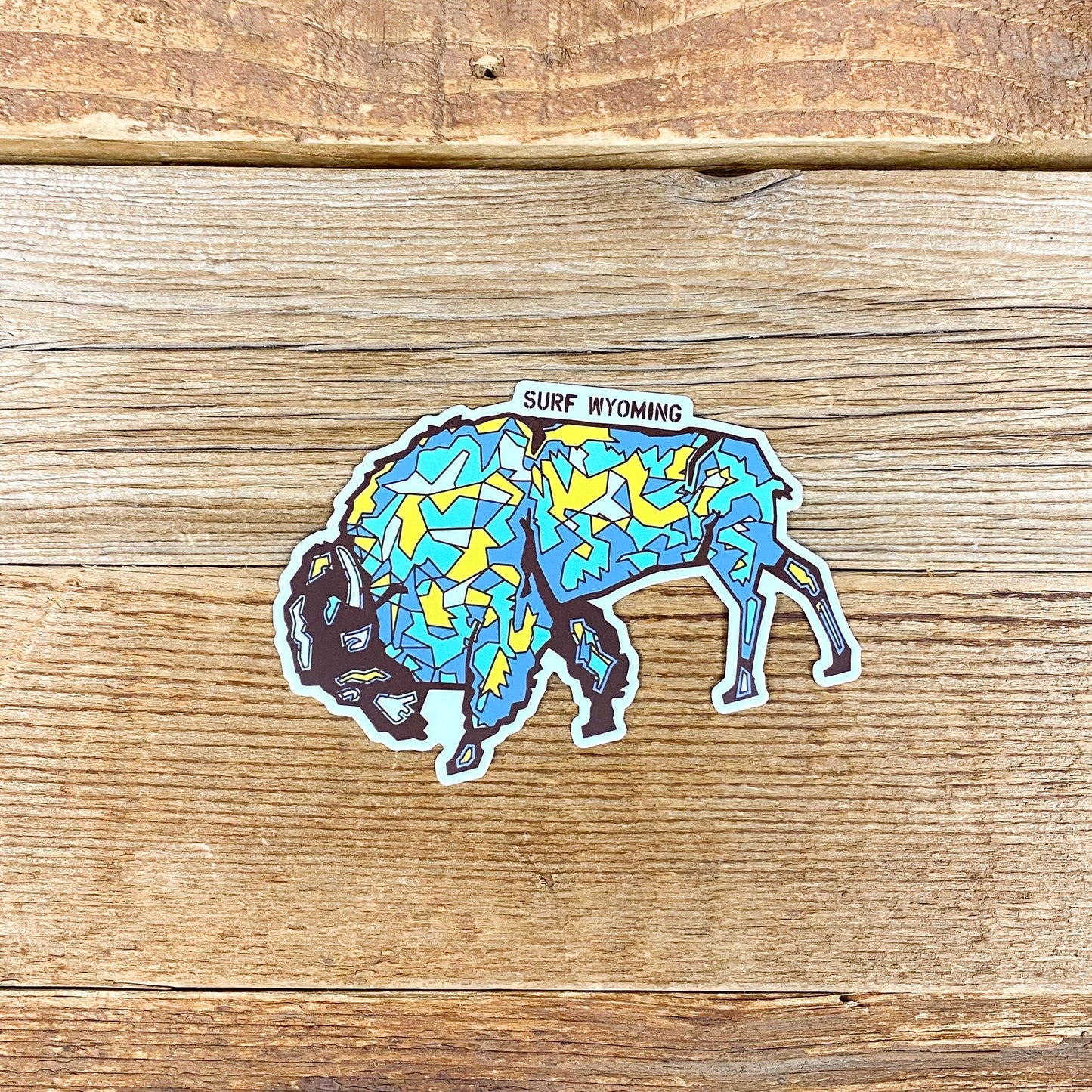 Surf Wyoming® Bison Gee'ode Logo Sticker - Yellow/Blue/Brown
